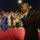 James Robert “Radio” Kennedy walks on the red carpet in his hometown as he arrives for a screening of the movie “Radio,” which is based on his life, Thursday, Oct. 23, 2003, in Anderson, S.C.